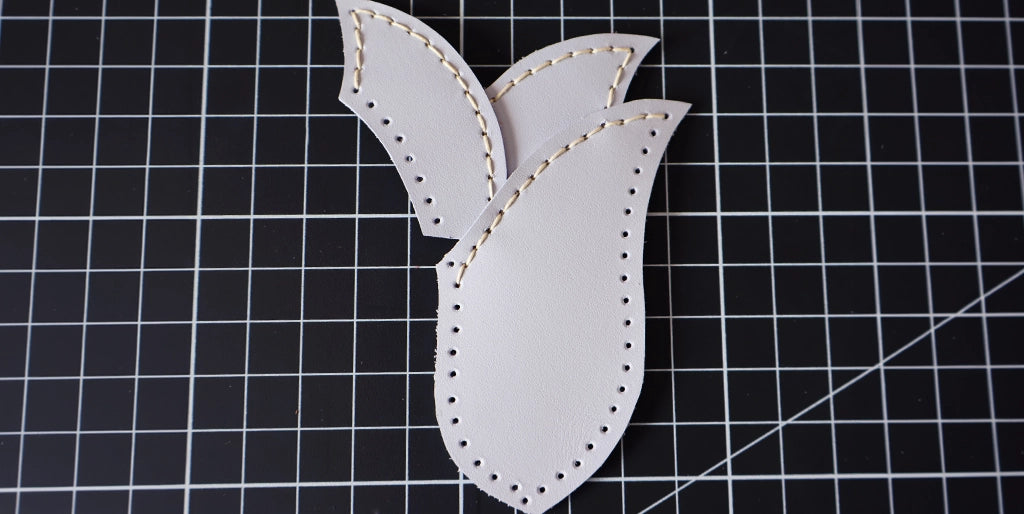 couture cloche à clés en cuir