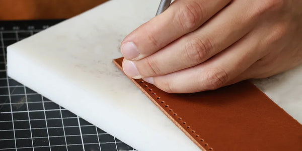 Percer les trous de couture