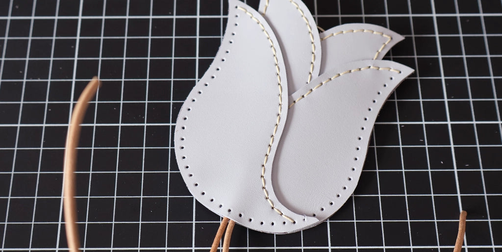couture cloche à clés en cuir