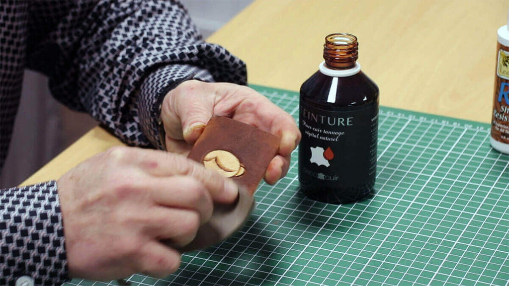 dyeing and embossing of leather