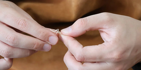 Nœud couture point anglais