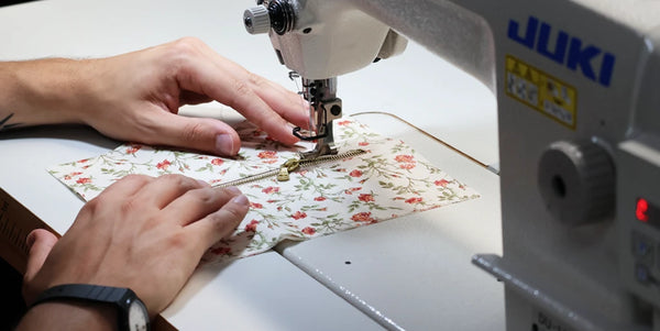 Stitch the zipper onto the pocket