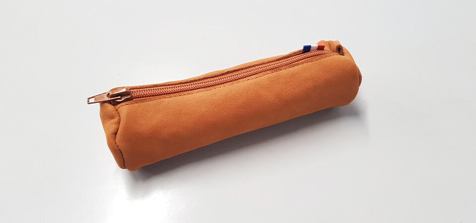 trousse ronde en cuir