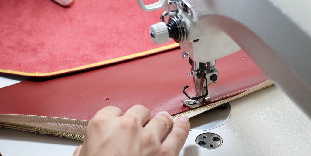 Sew the leather, zipper, and lining