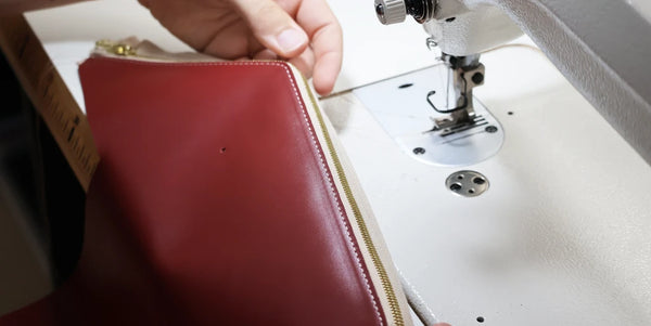 Sew the leather, zipper, and lining