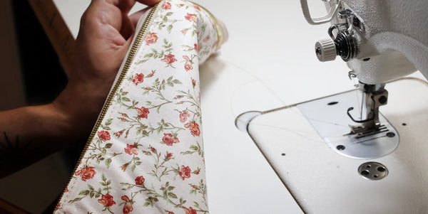 Sew the zipper, leather, and lining