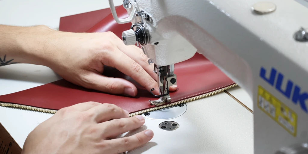 Sew the zipper, leather, and lining