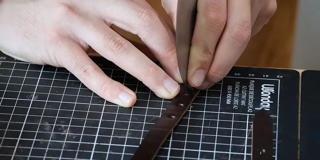 Cutting with a cutter between the holes