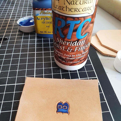 dyeing and embossing of leather