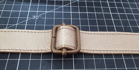 passer sangle boucle coulissante