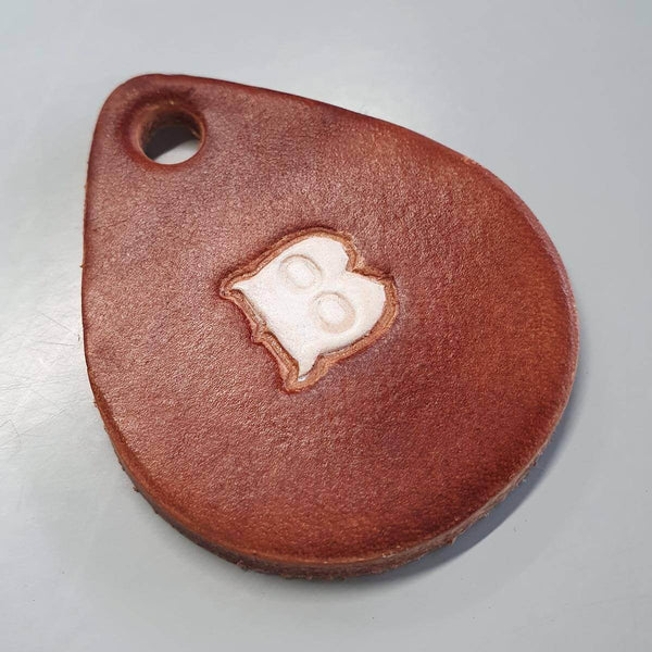 dyeing and embossing of leather