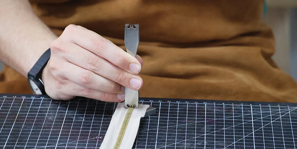 Remove zipper teeth