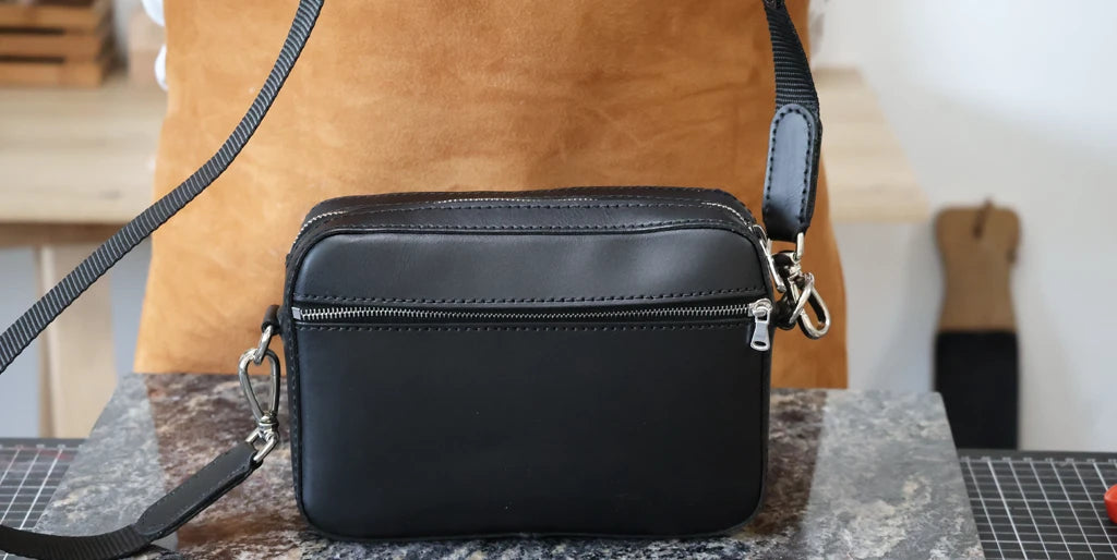 Attaccare la tracolla alla borsa