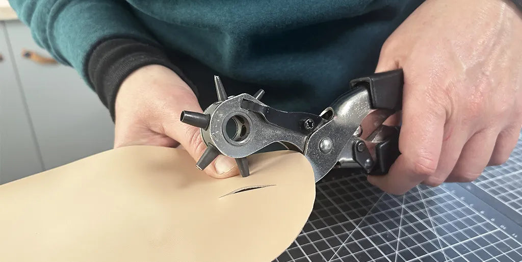 PIERCING THE LEATHER