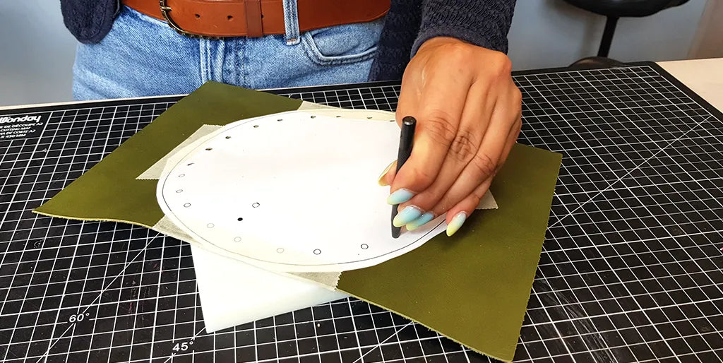 percer trous bourse cuir