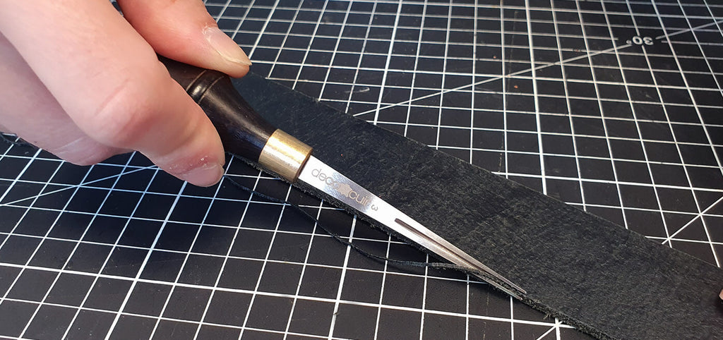 Quadratischer Lederschneider